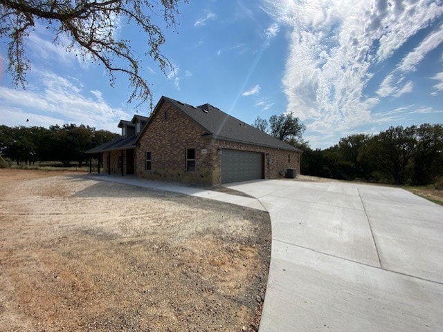 view of home's exterior with a garage