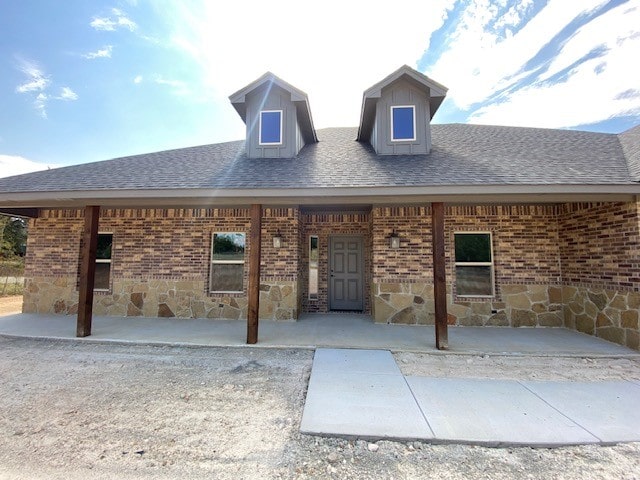 view of front of house featuring a patio area