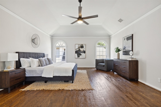 bedroom featuring ornamental molding, vaulted ceiling, ceiling fan, and dark hardwood / wood-style floors