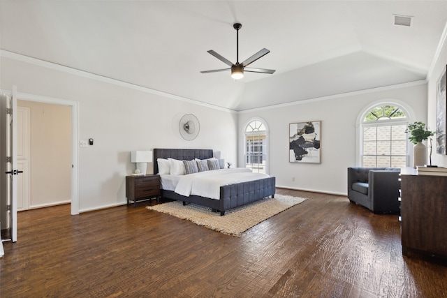 bedroom with crown molding, dark wood-type flooring, ceiling fan, and lofted ceiling