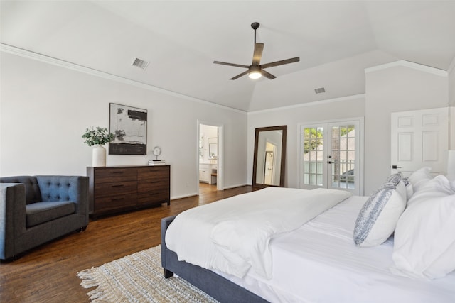 bedroom featuring lofted ceiling, ceiling fan, dark hardwood / wood-style flooring, and connected bathroom