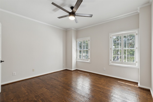 spare room featuring crown molding, ceiling fan, and dark hardwood / wood-style floors