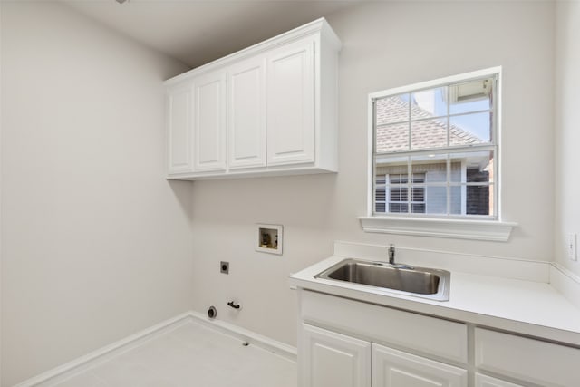 laundry area with cabinets, gas dryer hookup, sink, electric dryer hookup, and washer hookup