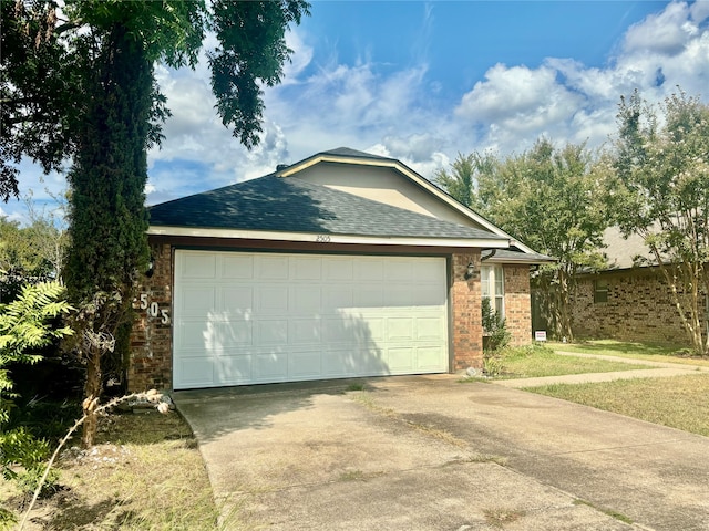 view of side of property featuring a garage