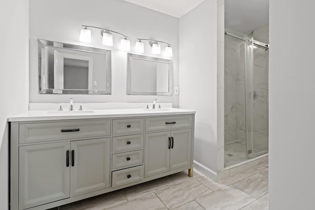 bathroom with vanity and a shower with shower door