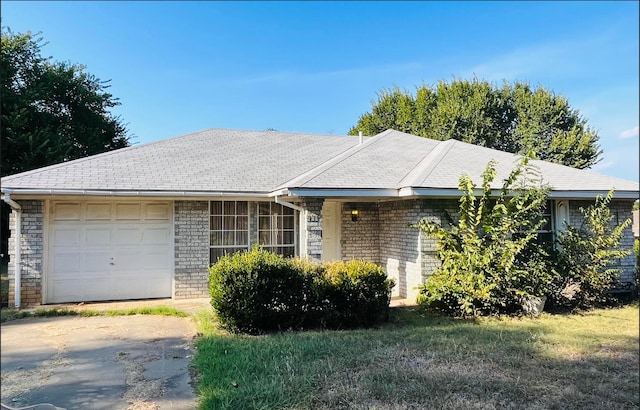 single story home with a garage