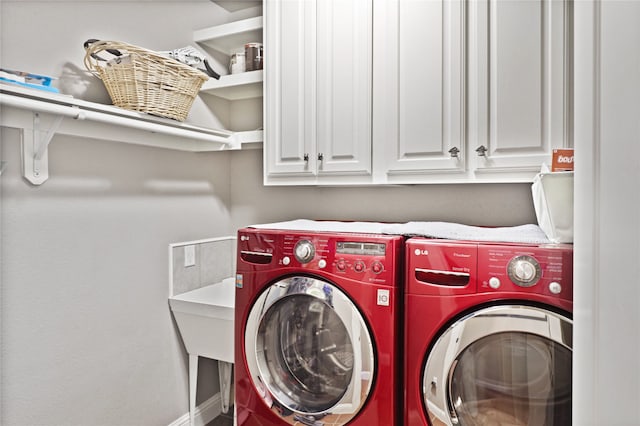 washroom with washer and dryer