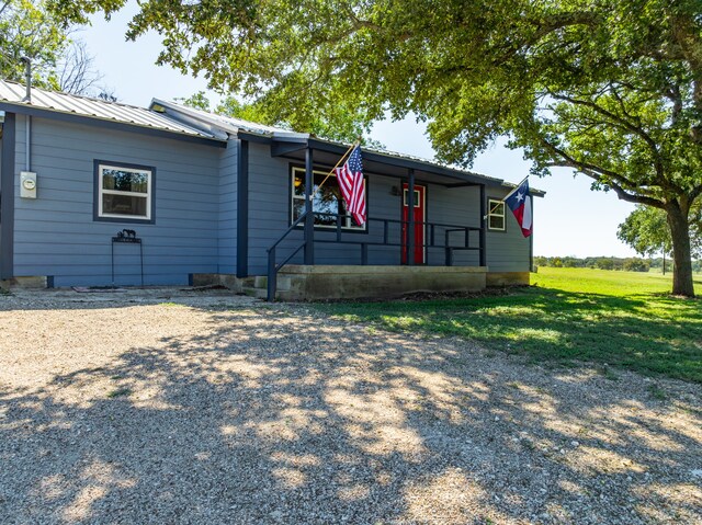 exterior space with a front lawn