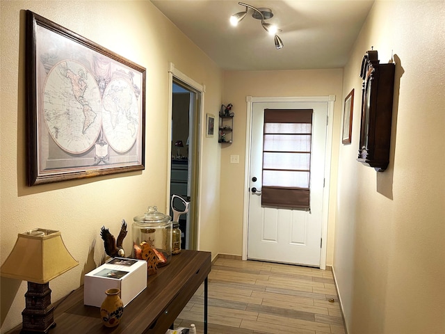 entryway with light hardwood / wood-style floors