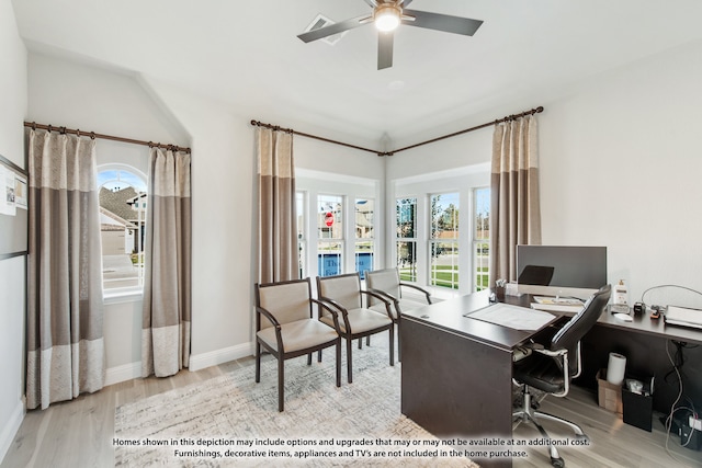 office space featuring ceiling fan and light hardwood / wood-style flooring