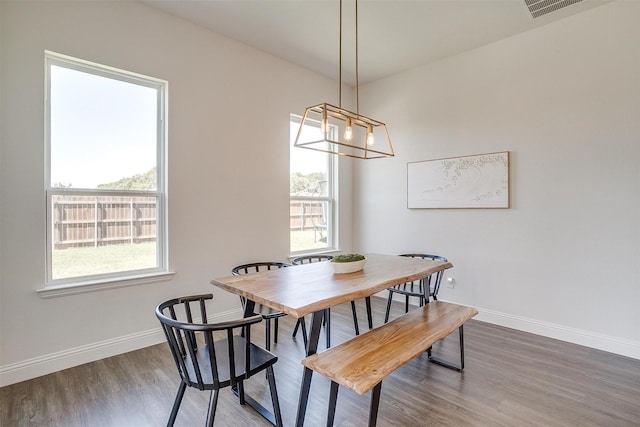 dining area featuring hardwood / wood-style floors