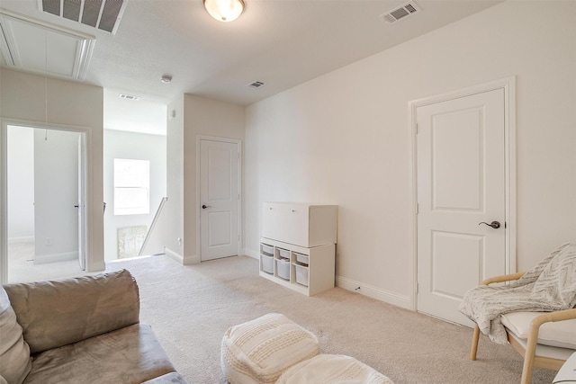 sitting room with light carpet