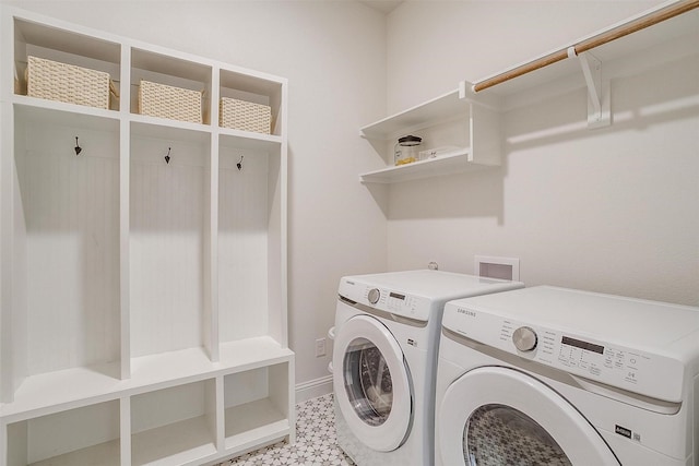 laundry room with independent washer and dryer