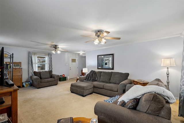 living area with carpet floors, ornamental molding, and ceiling fan