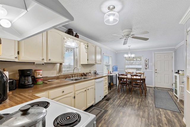 kitchen with a textured ceiling, white appliances, dark wood-type flooring, a sink, and ornamental molding