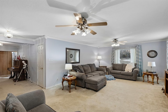 living room featuring ornamental molding, carpet, ceiling fan, and baseboards