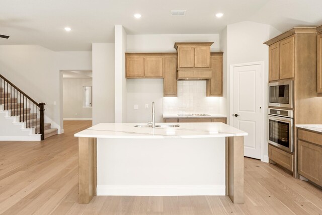 dining room featuring a healthy amount of sunlight and vaulted ceiling