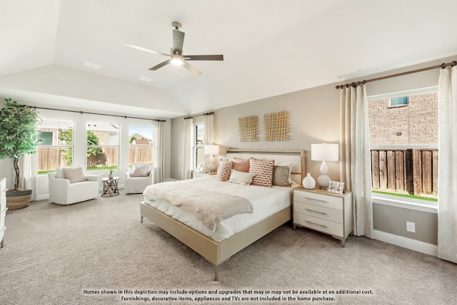 bedroom featuring ceiling fan, lofted ceiling, and light colored carpet