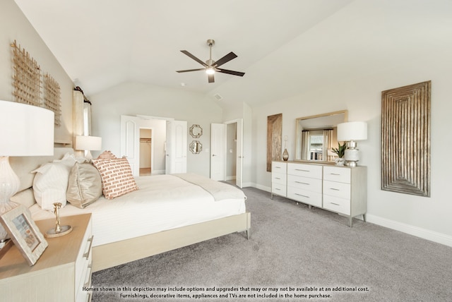 carpeted bedroom featuring lofted ceiling and ceiling fan