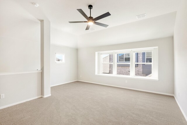 carpeted living room with lofted ceiling and ceiling fan