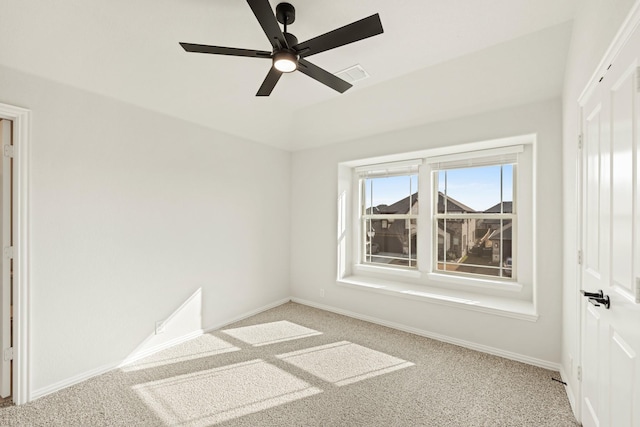 unfurnished room featuring light carpet and ceiling fan