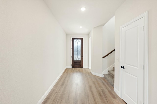 foyer with light hardwood / wood-style floors