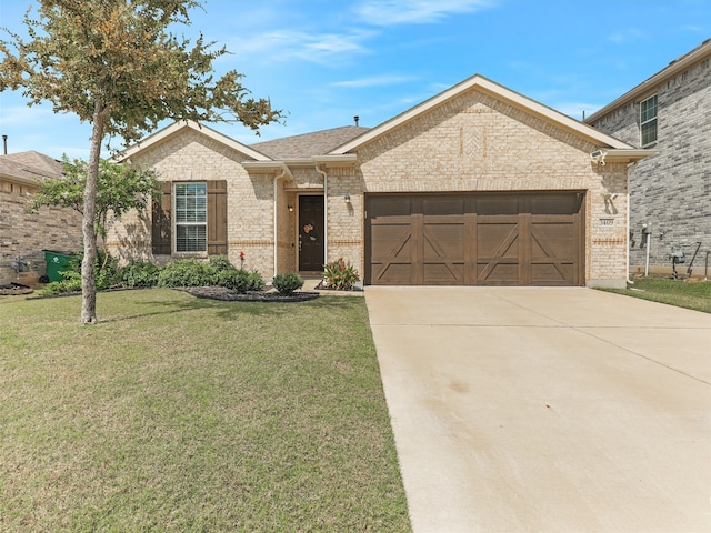 ranch-style home featuring a garage and a front yard