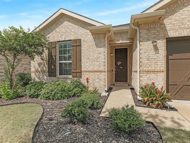 entrance to property with a garage