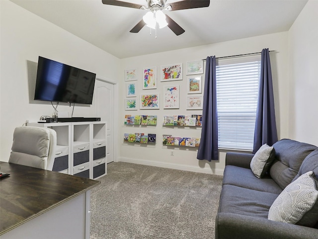 living room featuring ceiling fan and carpet floors