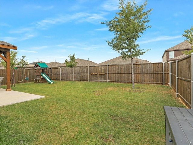 view of yard with a playground