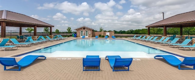 view of swimming pool featuring a patio area