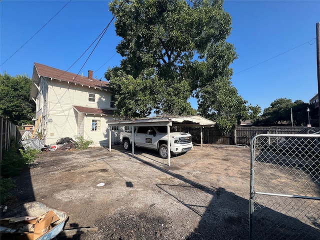 view of yard with a carport