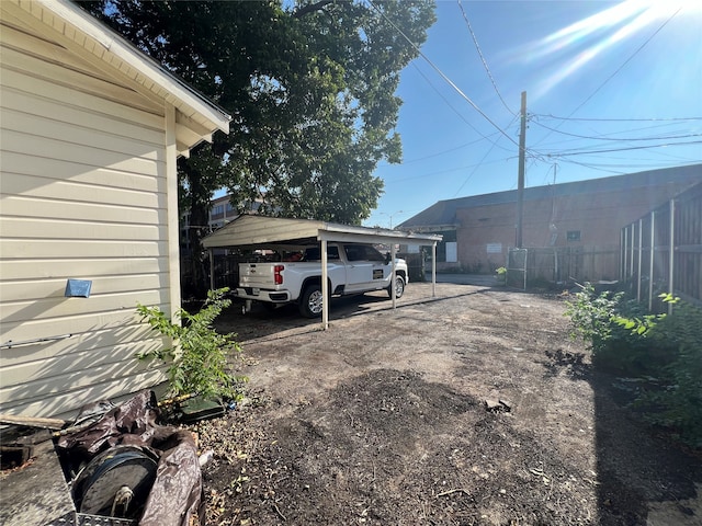 view of yard featuring a carport