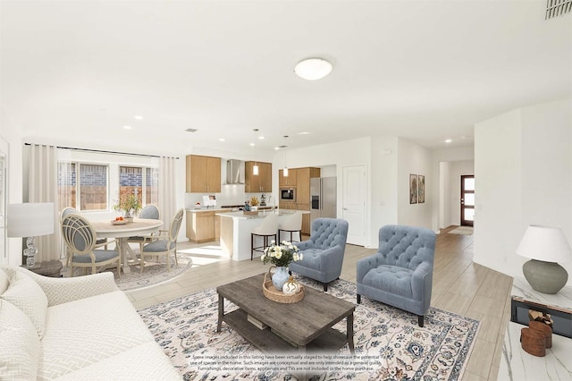 924 Alder Dr, Lavon, TX 75166 - living room with recessed lighting and light wood-style flooring