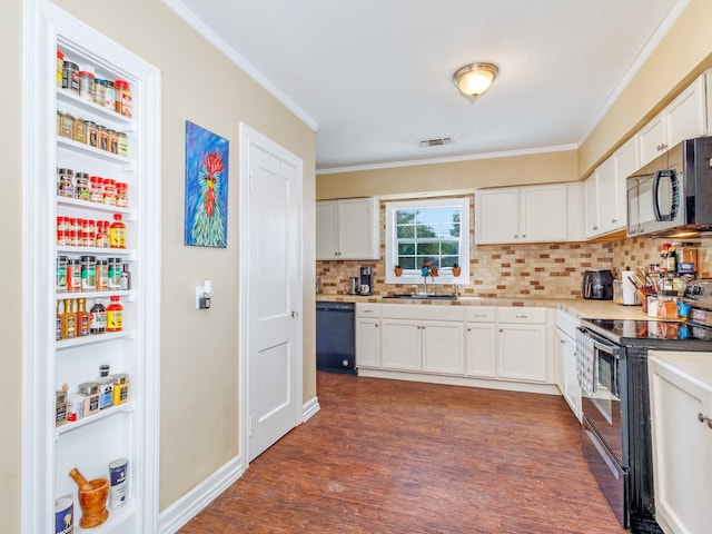 kitchen featuring white cabinets, stainless steel appliances, dark hardwood / wood-style floors, and sink