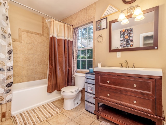 full bathroom featuring shower / bath combo with shower curtain, tile patterned flooring, toilet, and vanity