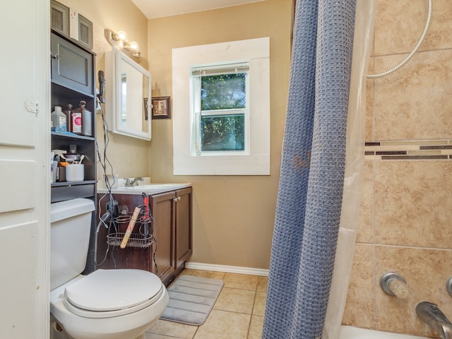 bathroom featuring vanity, toilet, a shower with shower curtain, and tile patterned floors