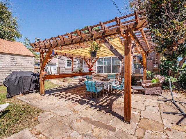 view of patio / terrace with a pergola, area for grilling, and outdoor lounge area