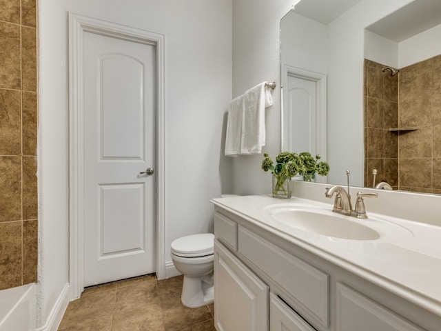 bathroom featuring toilet and vanity