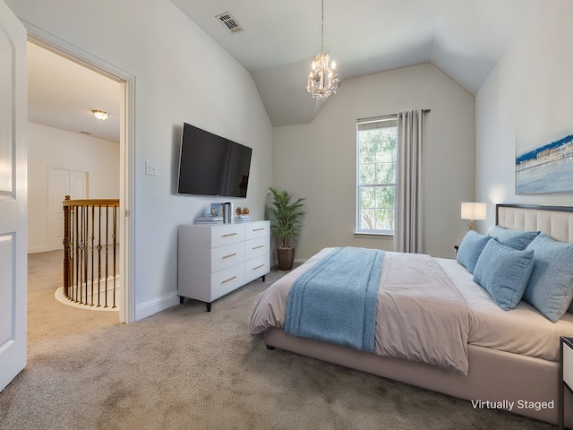 bedroom with light colored carpet, an inviting chandelier, and lofted ceiling