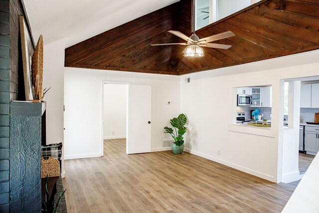 living room with ceiling fan and light hardwood / wood-style floors