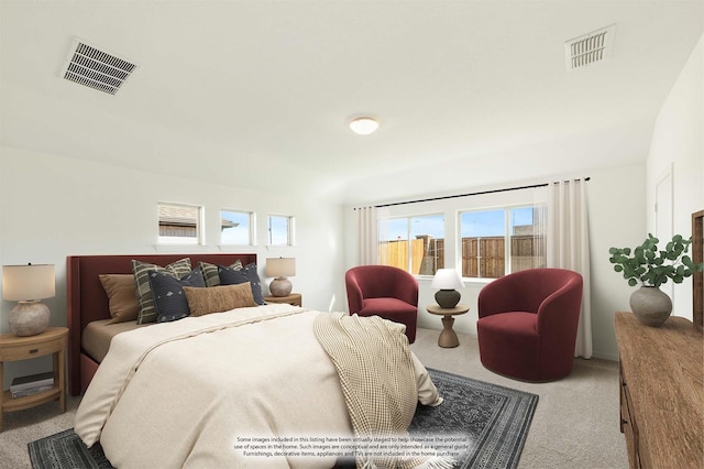 bedroom featuring light colored carpet