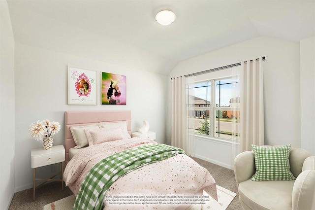 carpeted bedroom with vaulted ceiling