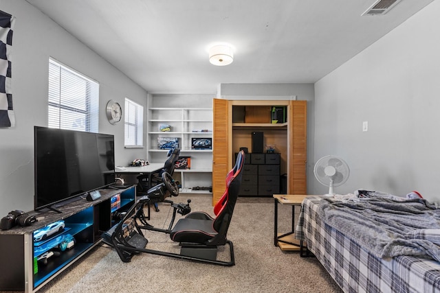 805 S 3rd St, Grandview, TX 76050 - carpeted bedroom with visible vents and a closet