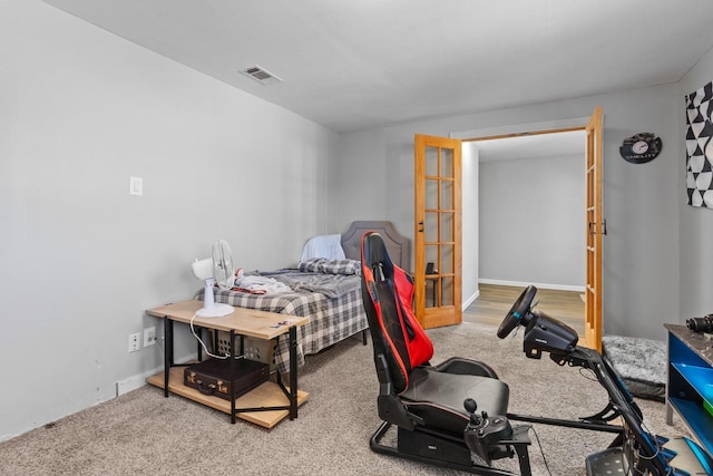 805 S 3rd St, Grandview, TX 76050 - bedroom featuring carpet floors, baseboards, and visible vents