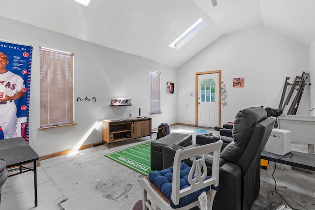 living room with lofted ceiling with skylight