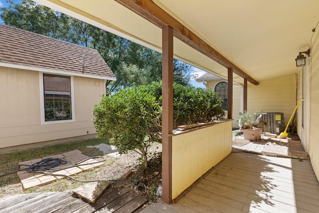 805 S 3rd St, Grandview, TX 76050 - wooden deck featuring central AC