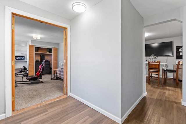 805 S 3rd St, Grandview, TX 76050 - hallway with baseboards and wood finished floors