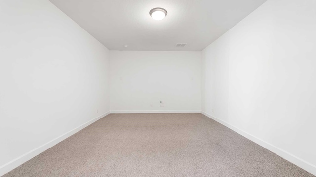 empty room featuring carpet floors