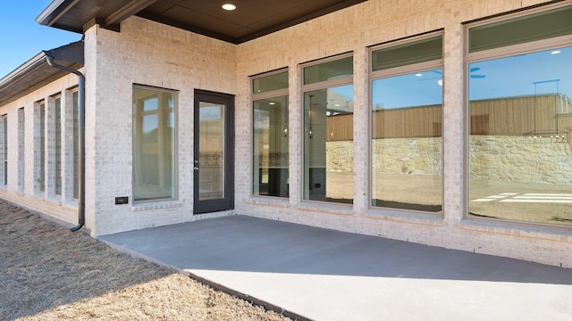 doorway to property featuring a patio area